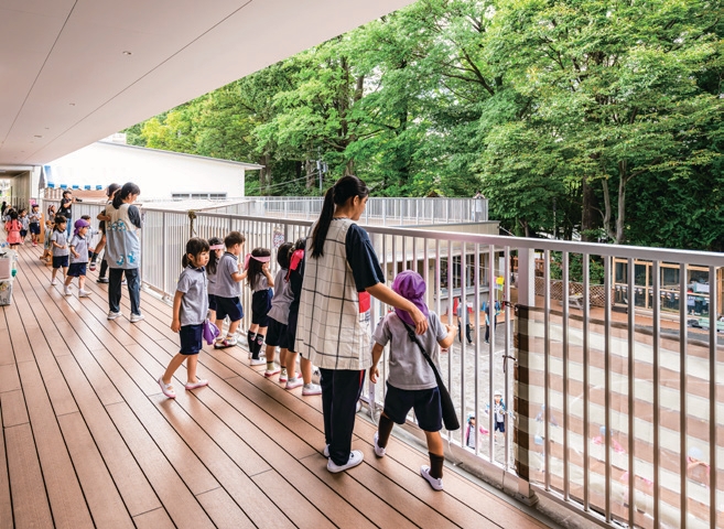 Outside the house, under the eaves
