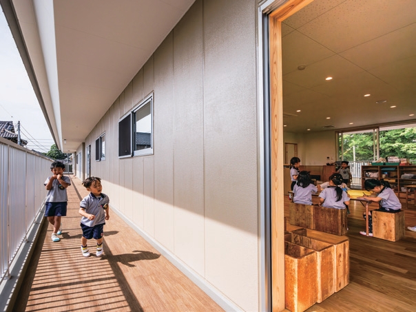Outside the house, under the eaves